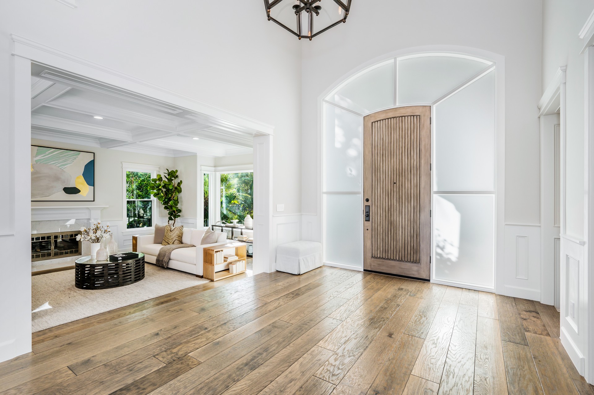 Elegant foyer with wooden floors and a grand entrance